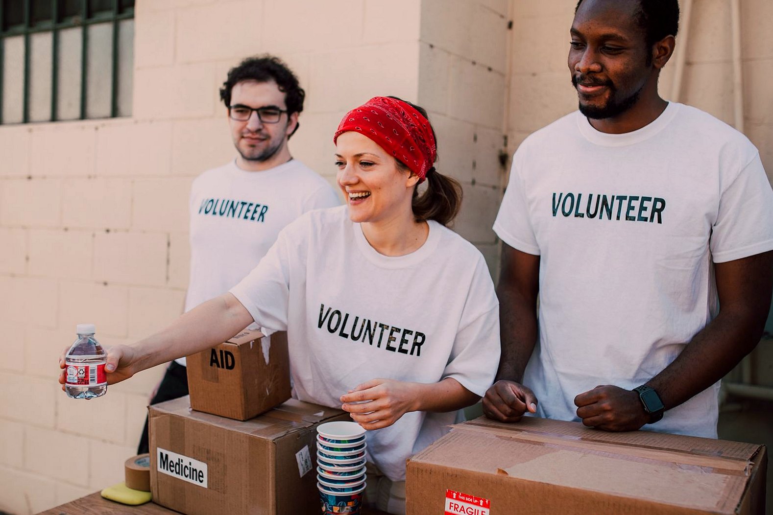 Volunteers preparing donated goods together